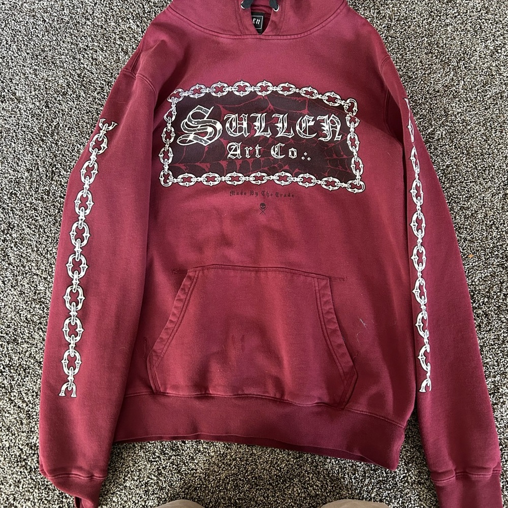 Sullen large sweater.